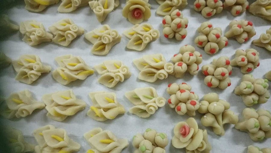 dough flowers on baking pan at 'Agrotouristic Women's Cooperative of Mesotopos Lesvos'